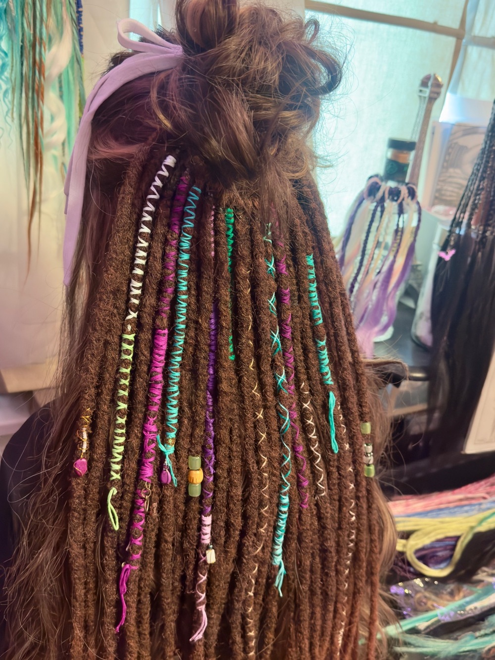 Handcrafted Brown Dreadlock Extensions with Purple & Teal Accents